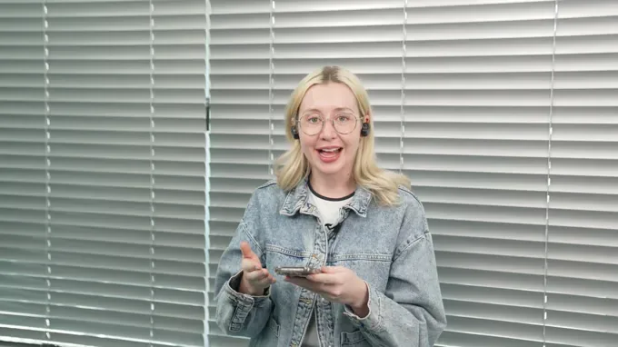 Brooke, a recording artist, holding her BeCozU case
