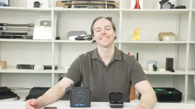 Scott, a writer, with his BeCozU box and charging case